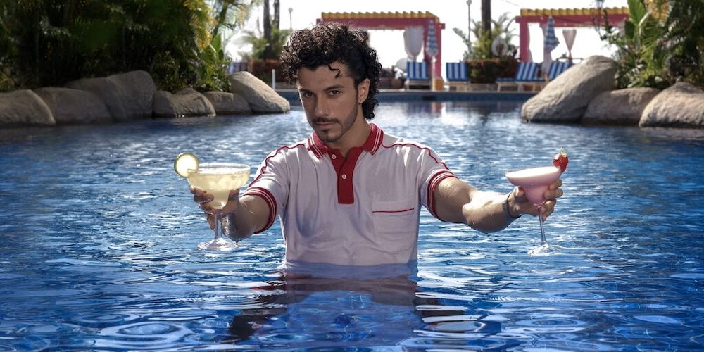 Maximo holds cocktails in the pool in Acapulco