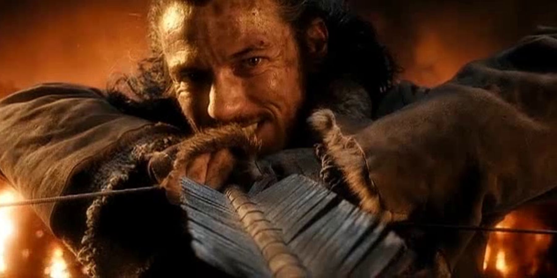 Bard the Bowman fighting Smaug in The Hobbit