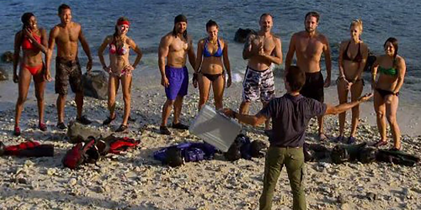 The host addresses the cast of 72 Hours on the beach in a scene from the reality show.