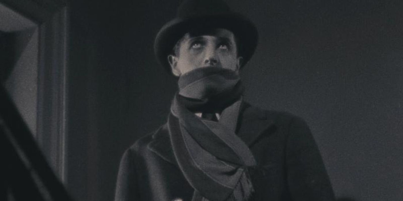 A man looking up in the film The Lodger A Story of the London Fog