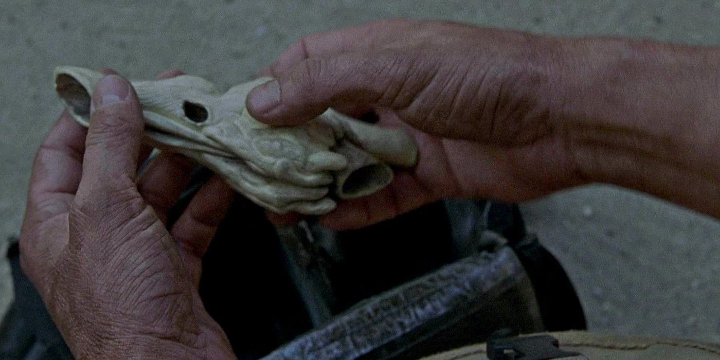 Alan Grant Holding the raptor resonating chamber in Jurassic Park III