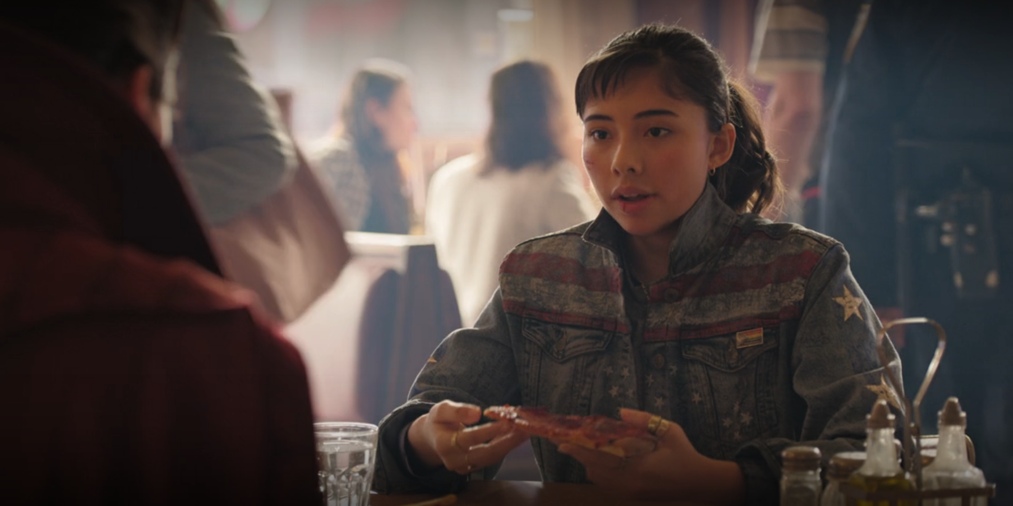 America Chavez eating pizza in Doctor Strange in the Multiverse of Madness