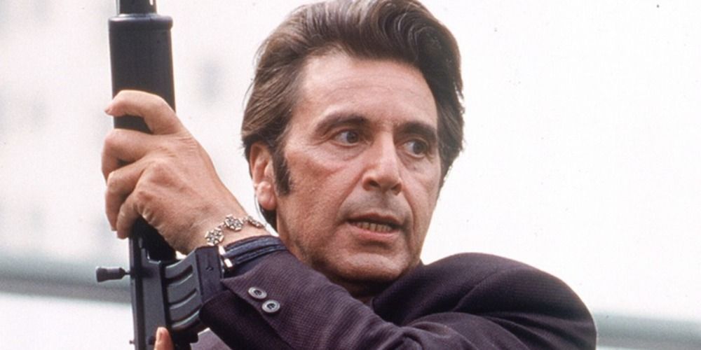 Uma imagem de Al Pacino segurando uma arma em Heat