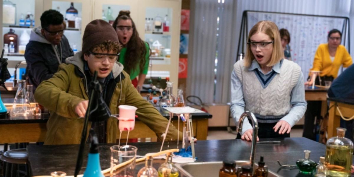 An image of Gaten Matarazzo and Angourie Rice using science 