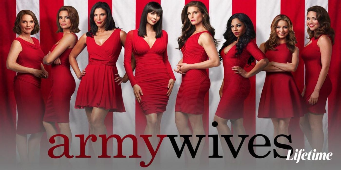The wives in the show posing in red together