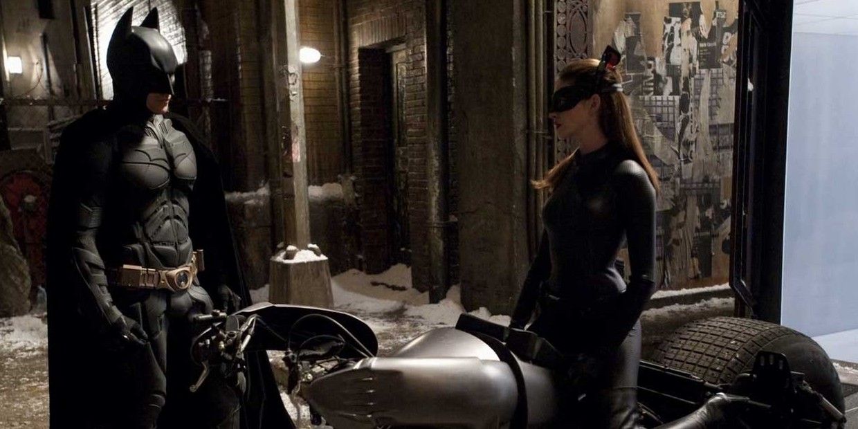 Batman talking to Catwoman on a motorcycle in The Dark Knight Rises