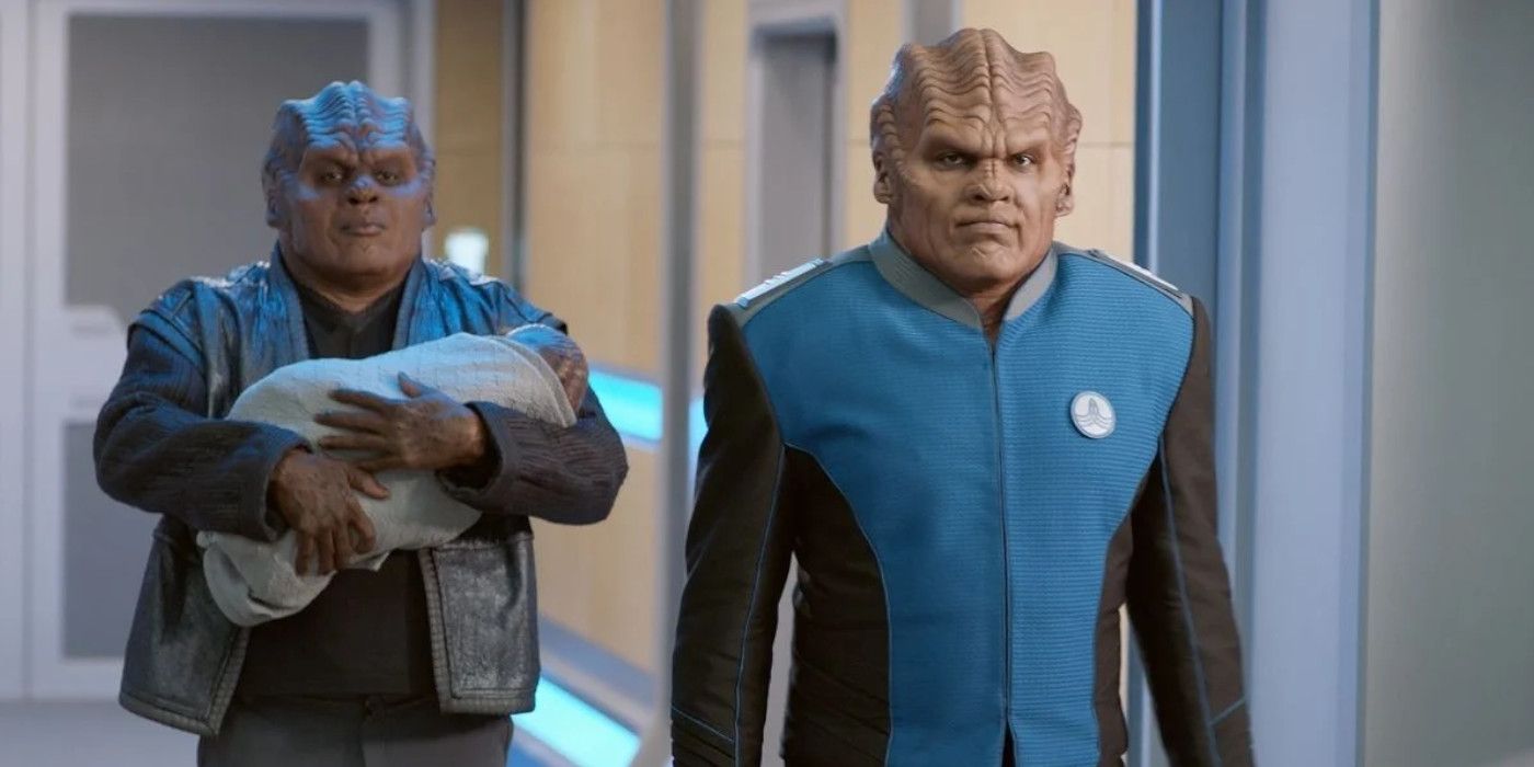 Bortus and Klydon with their child in The Orville