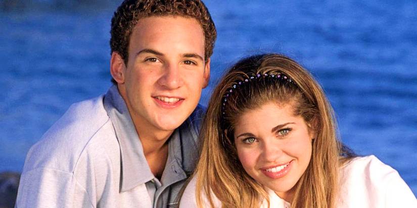 Cory and Topanga smiling at the camera with water in the background in Boy Meets World
