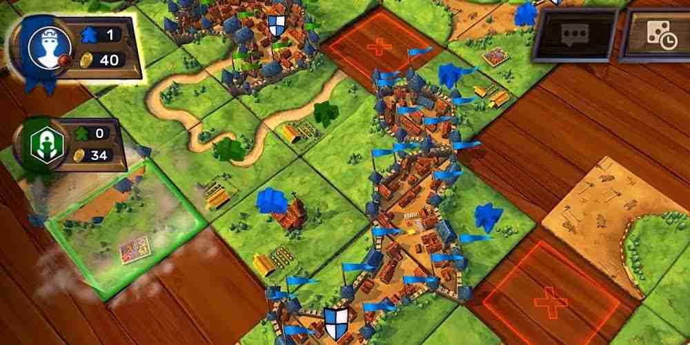 Carcassone&rsquo;s tile based gameplay sits on a table.