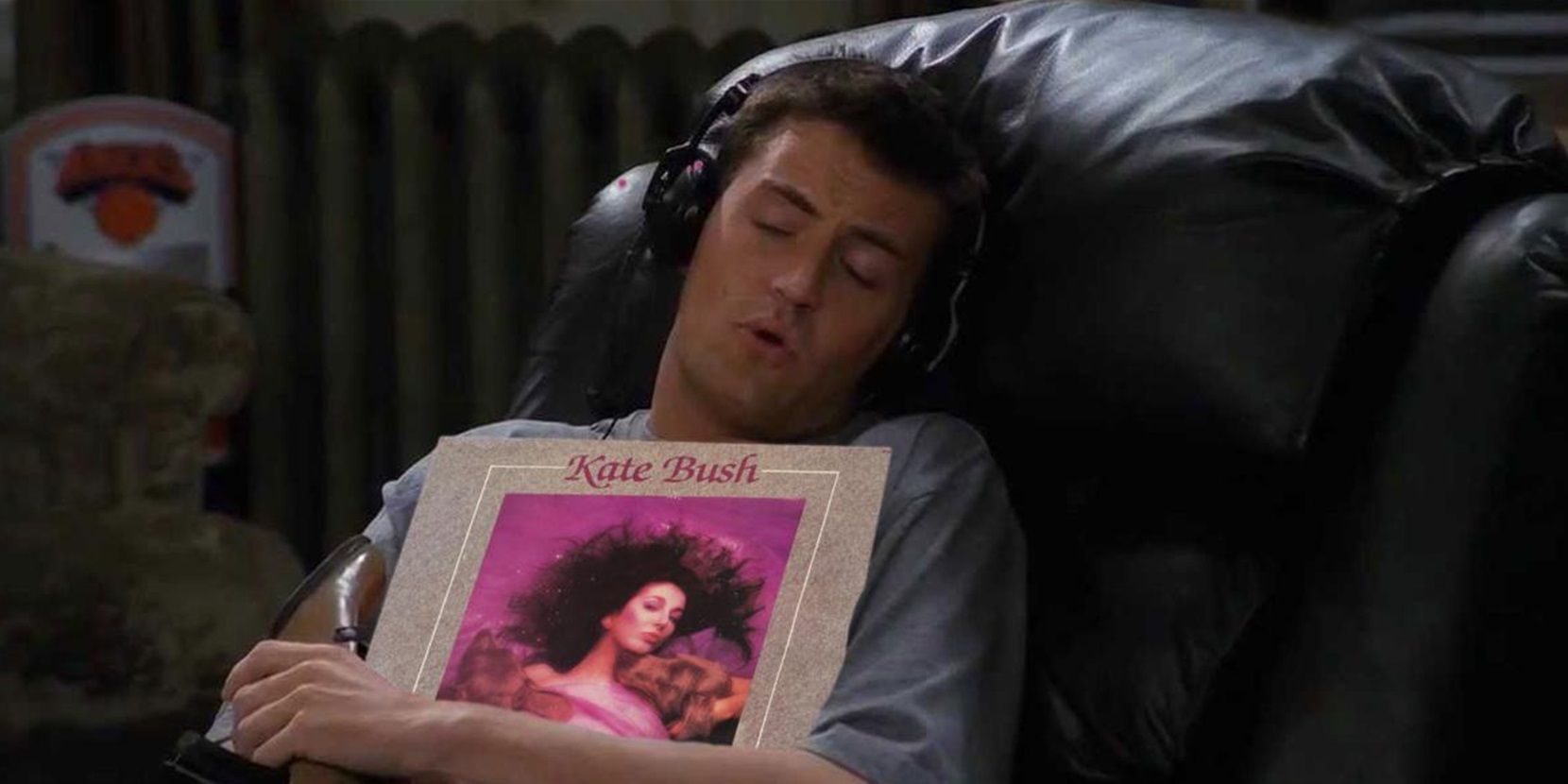 Chandler holding a Kate Bush record