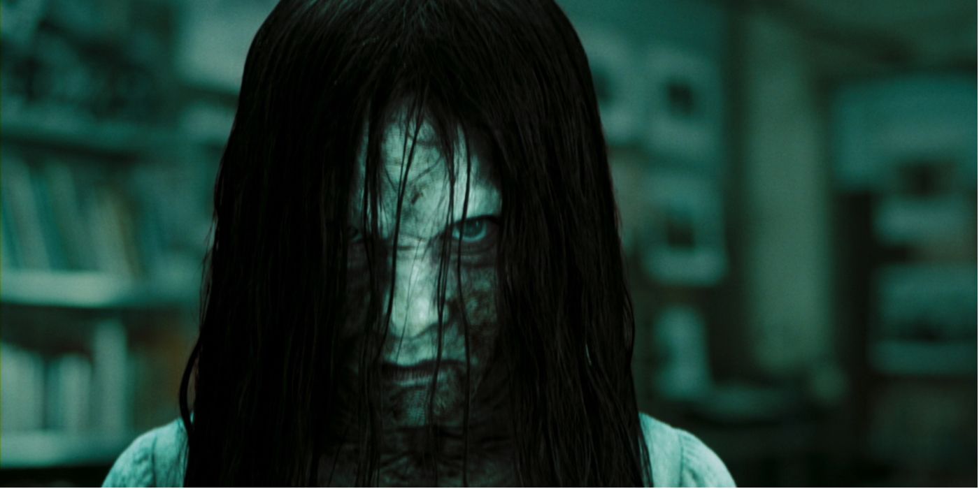 Spooky girl from the Ring looking at the camera