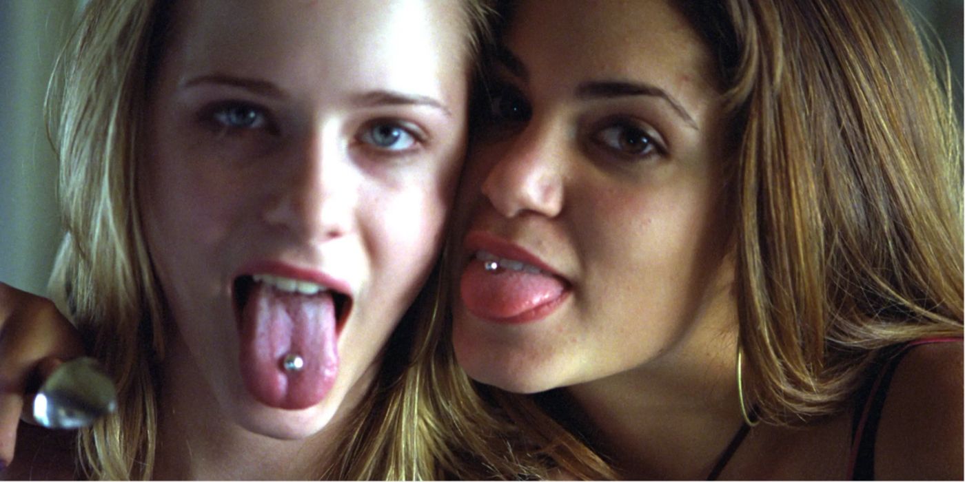 Tracy and Evie showing off their tongue piercings in Thirteen