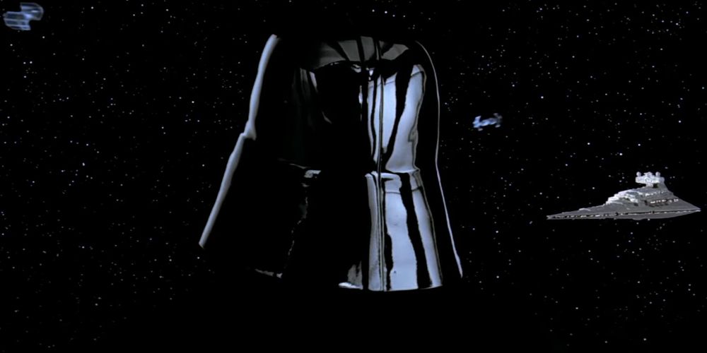 Darth Vader lo0ks out intro space and at two TIE Fighters and a Star Destroyer in The Empire Strikes Back