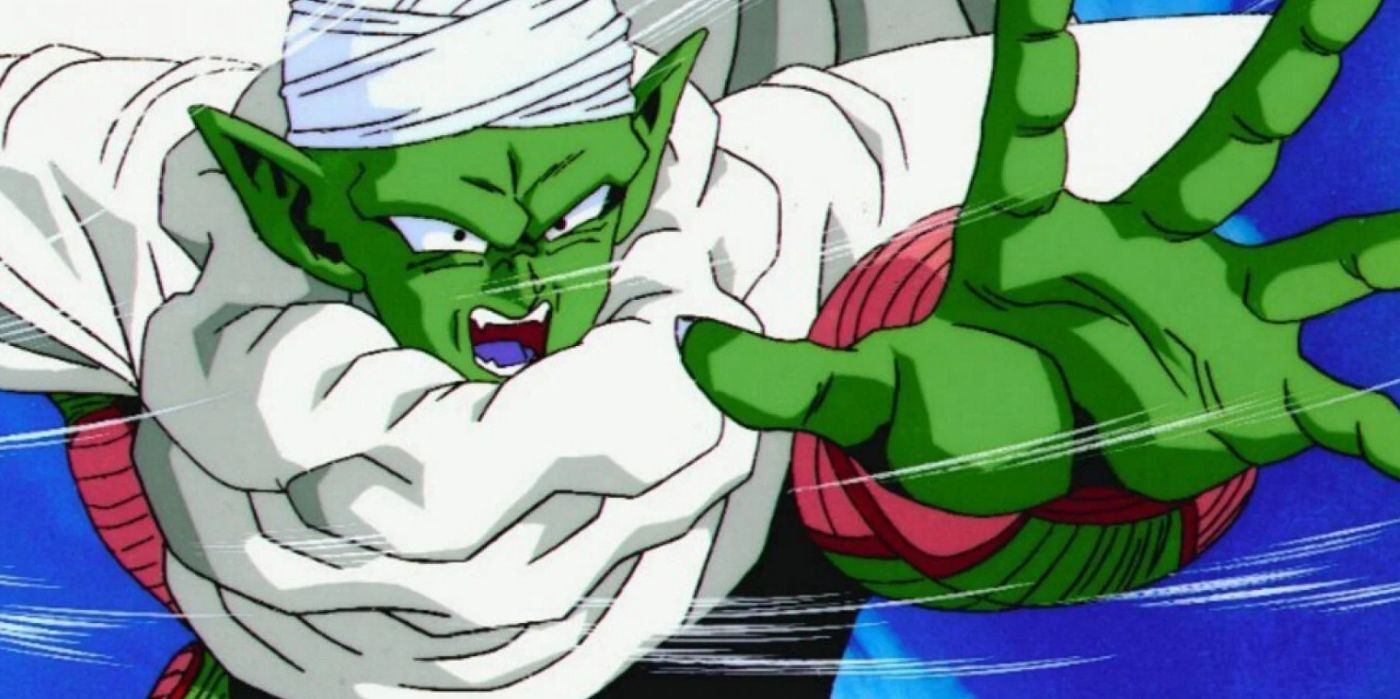 Dragon Ball Z character Piccolo in his turban and battle cape preparing to shoot an energy blast.