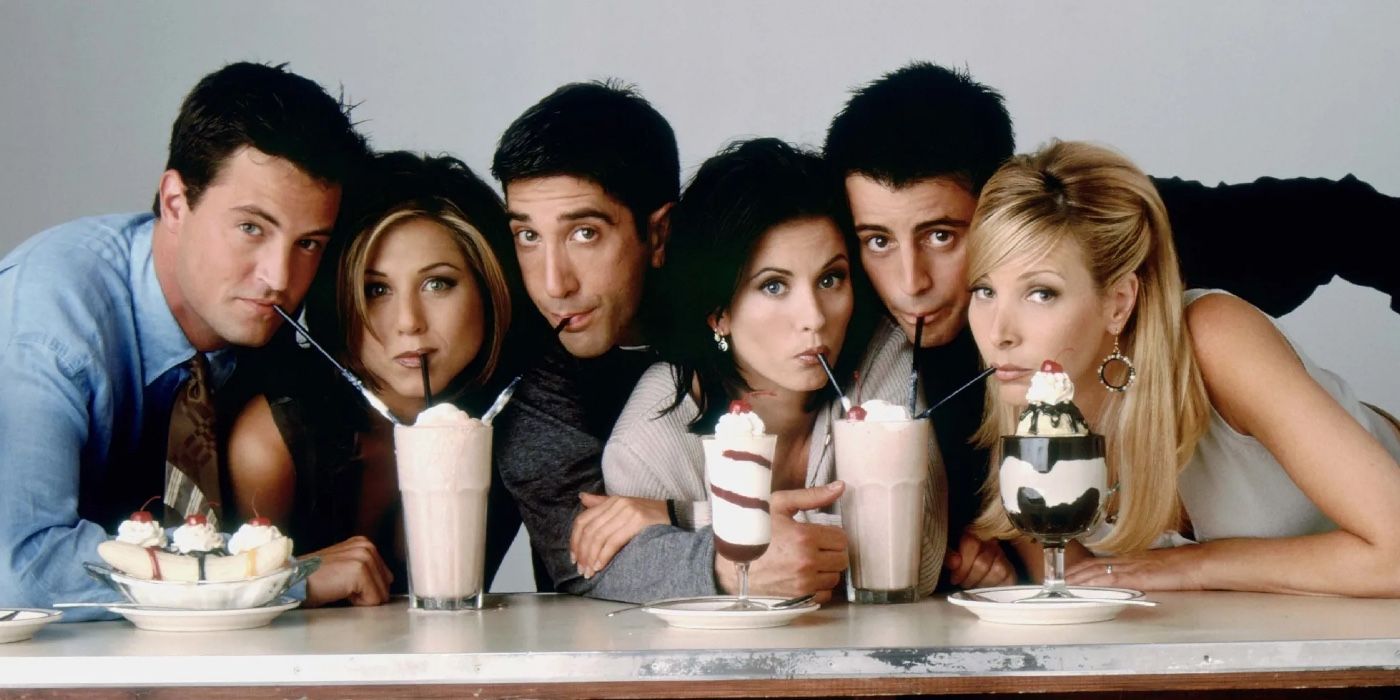 Friends group shot drinking milkshakes
