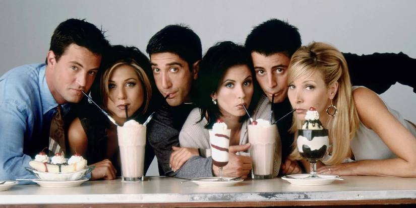 Friends group shot drinking milkshakes