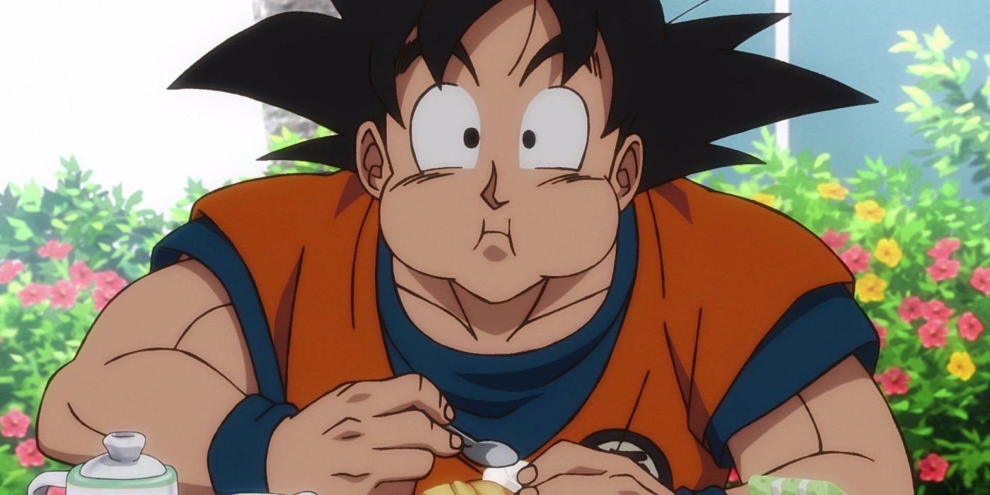 Goku staring with his mouth full of food