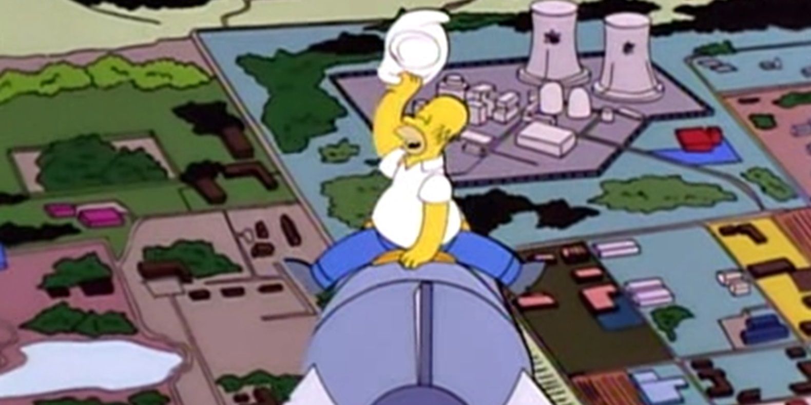 Homer rides a bomb like Dr Strangelove in The Simpsons