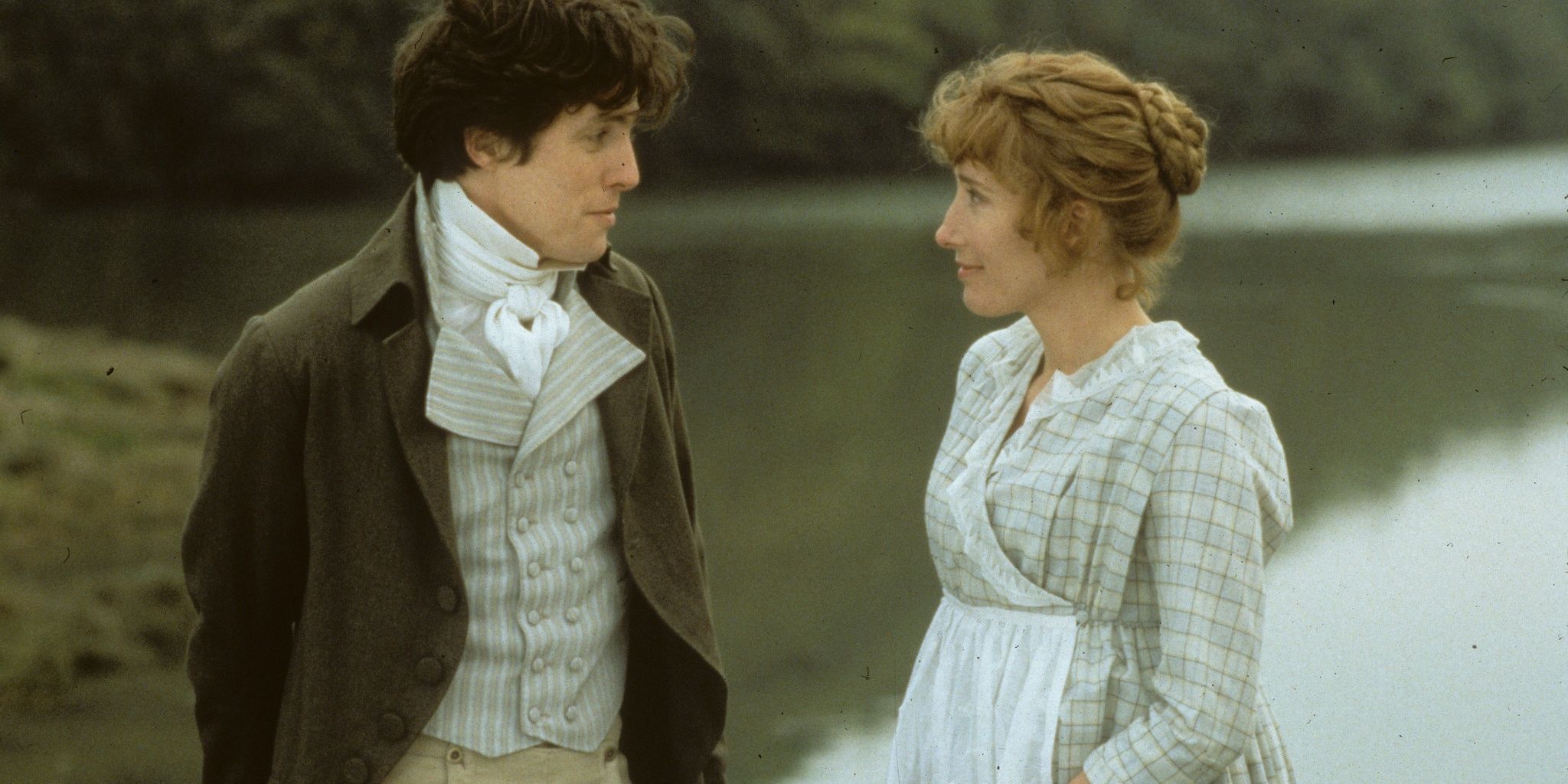 Hugh Grant talking to Emma Thompson in Sense And Sensibility Cropped
