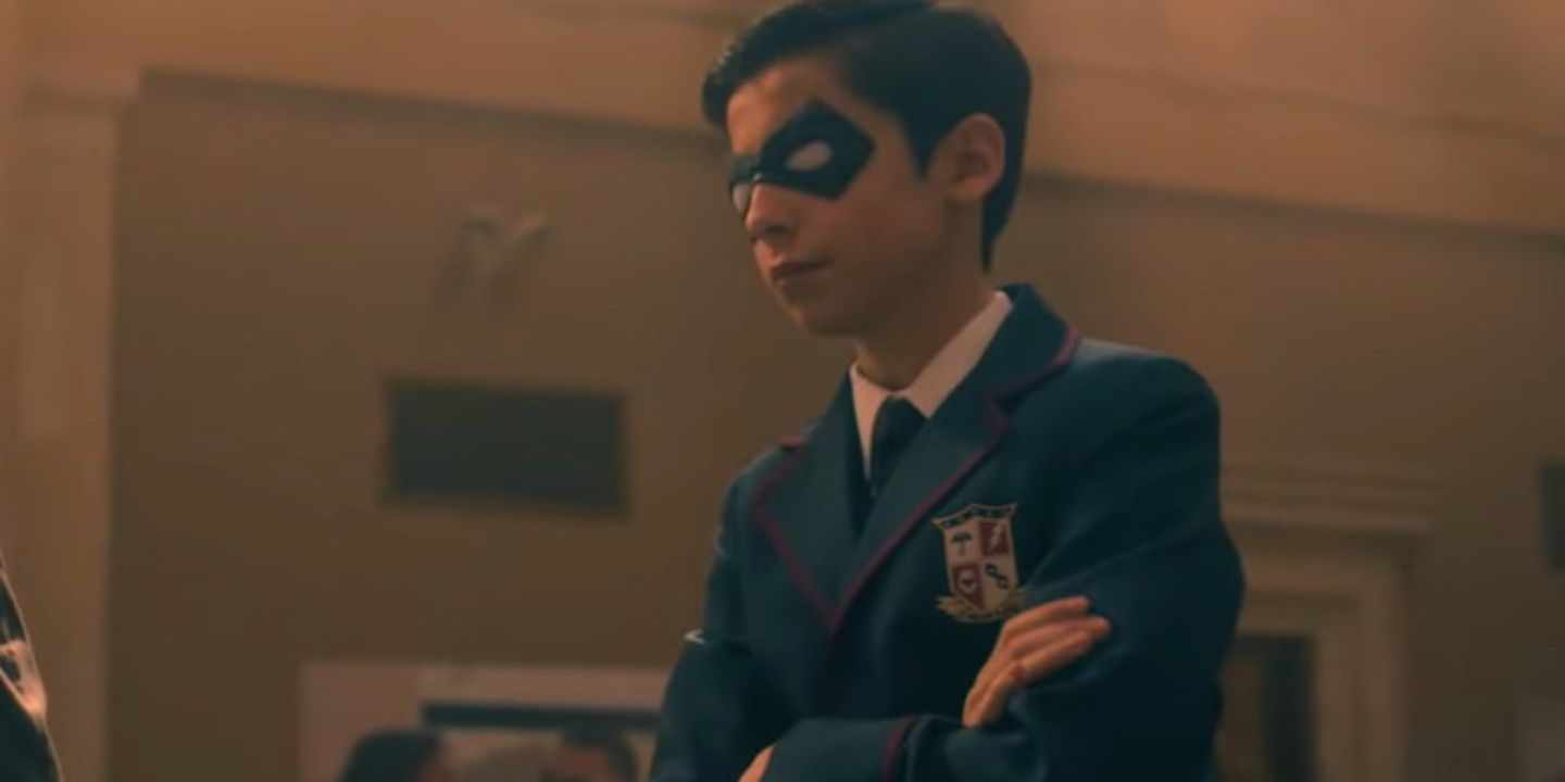 Image of Number Five dressed up in his Umbrella Academy uniform with mask