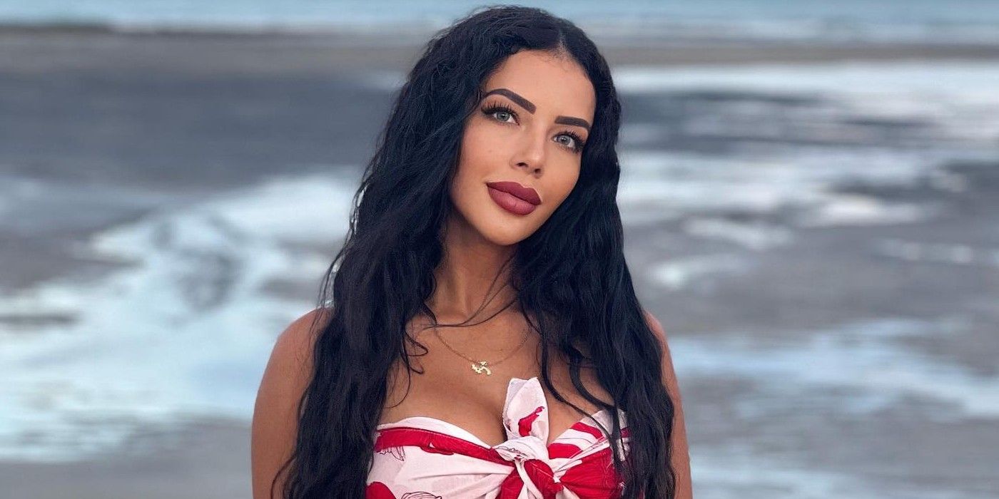 Jasmine Pineda from 90 Day Fiancé posingin front of water