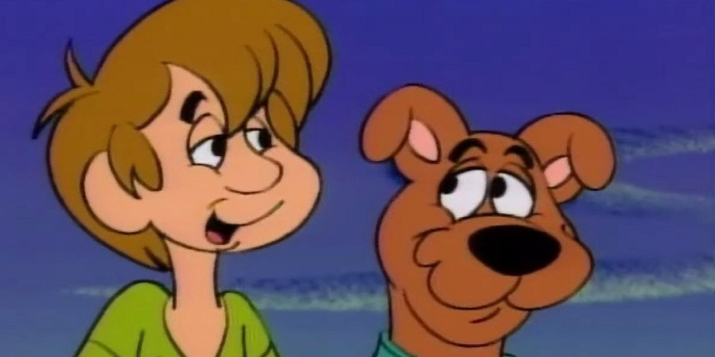 Scooby smiling at Shaggy in Scooby Doo