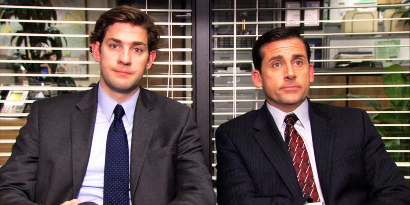 Jim and Michael sit together in The Office