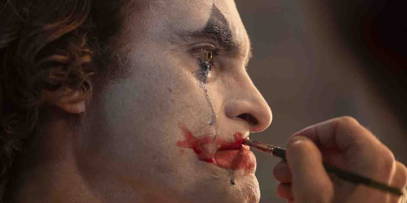 Joker painting his face.
