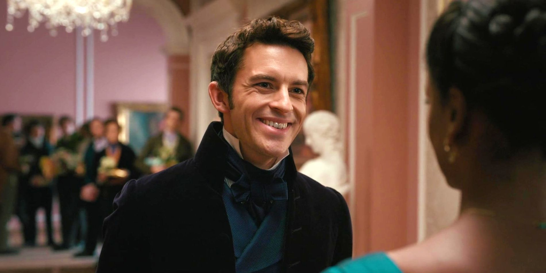 Jonathan Bailey as Anthony Bridgerton smiling at Simone Ashley as Kate Sharma in Bridgerton season 2