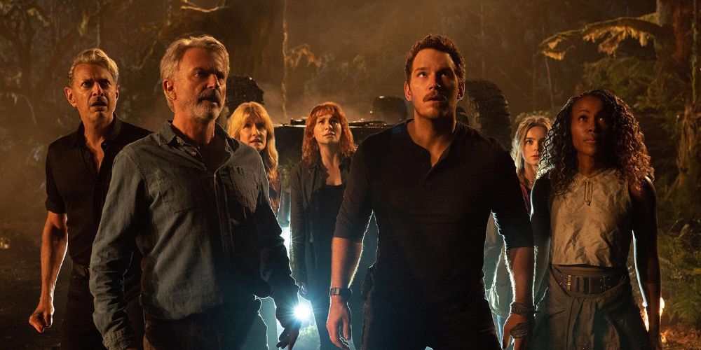 The cast of Jurassic World Dominion stand in terror as they realize another Dino crisis is about to happen