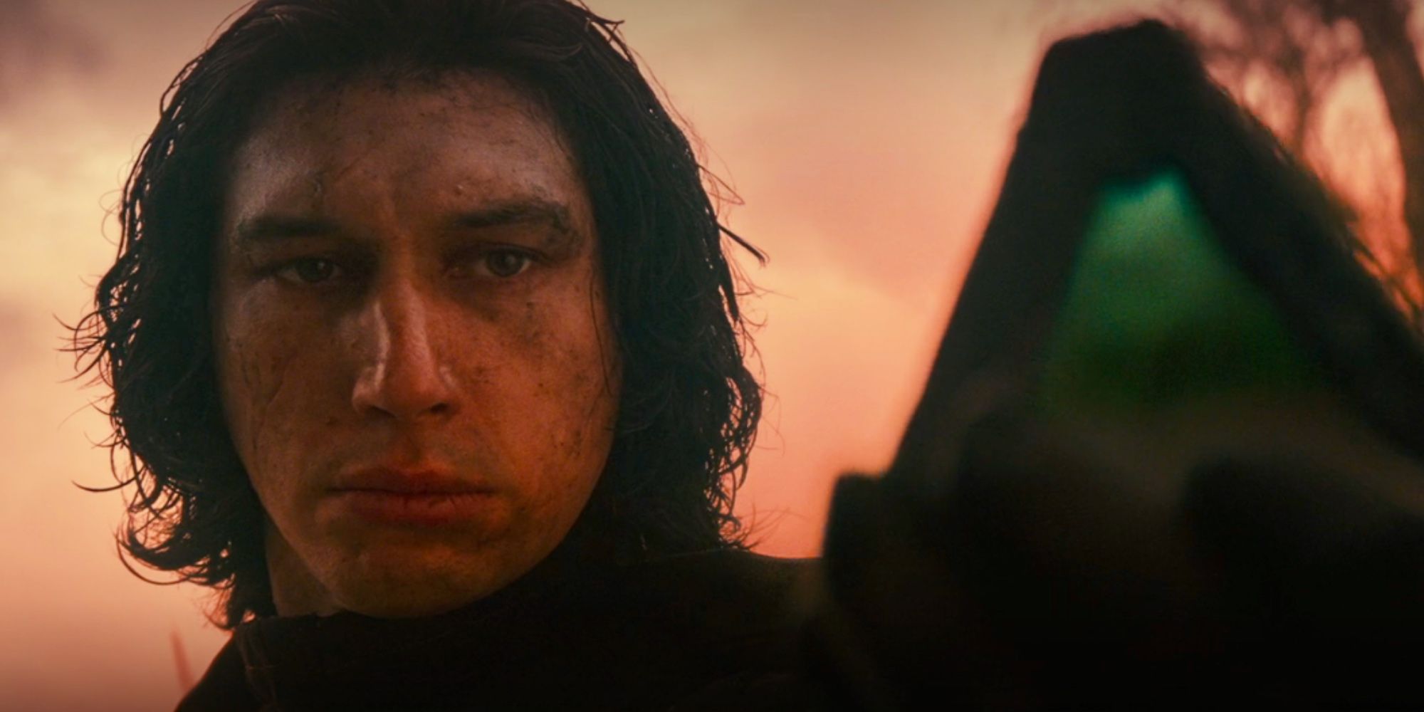 Kylo Ren holding up a Sith Wayfinder in The Rise of Skywalker.