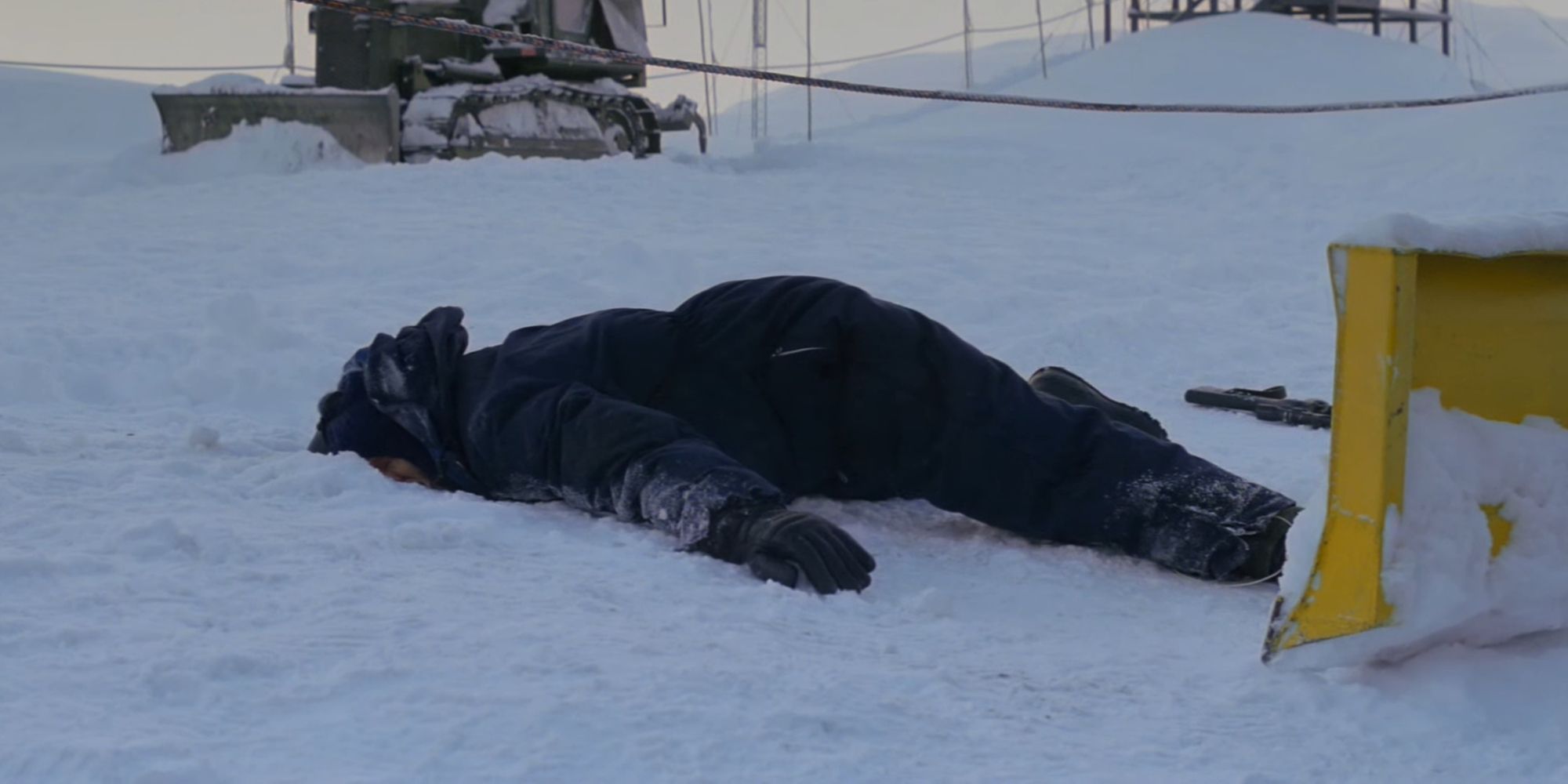 Lars lying dead in the snow in John Carpenters The Thing