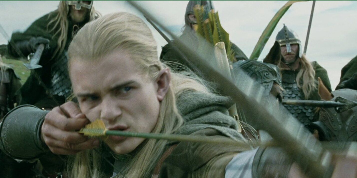 Legolas responds angrily when Eomer threatens Gimli