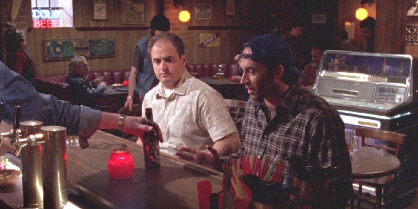 Luke and TJ sitting at the bar in Gilmore Girls