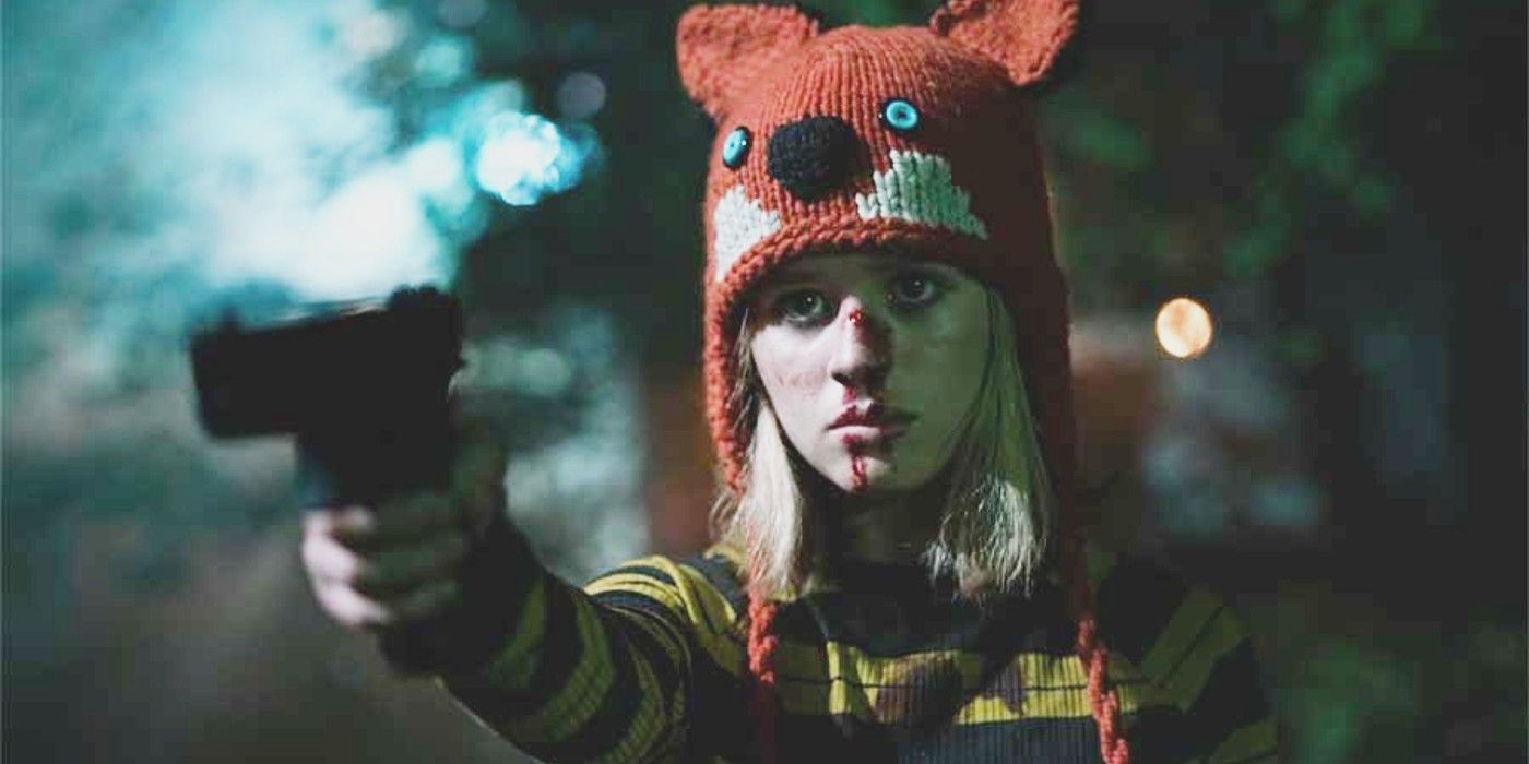 Lulu Wilson holding a gun in Becky