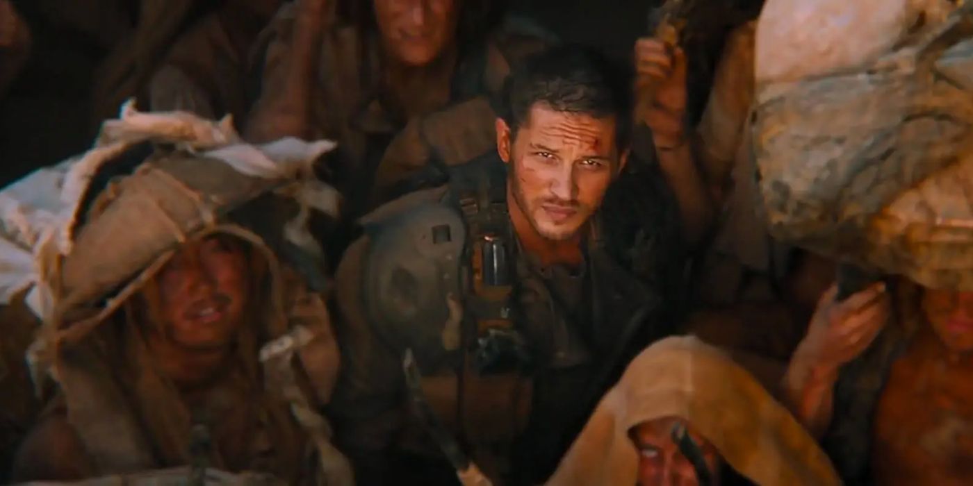 Max looking up in a crowd in Mad Max Fury Road