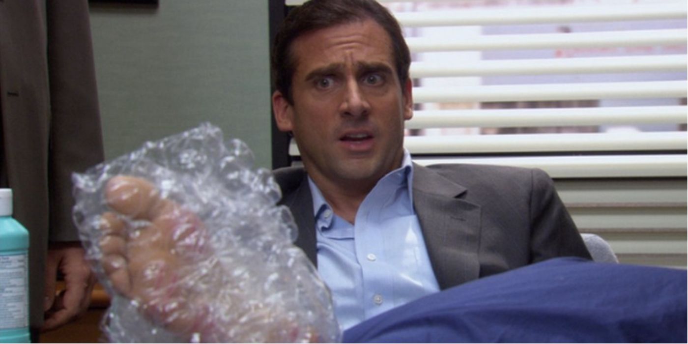 Michael Scott burns his foot on a girll and shows it to the camera crew in The Office