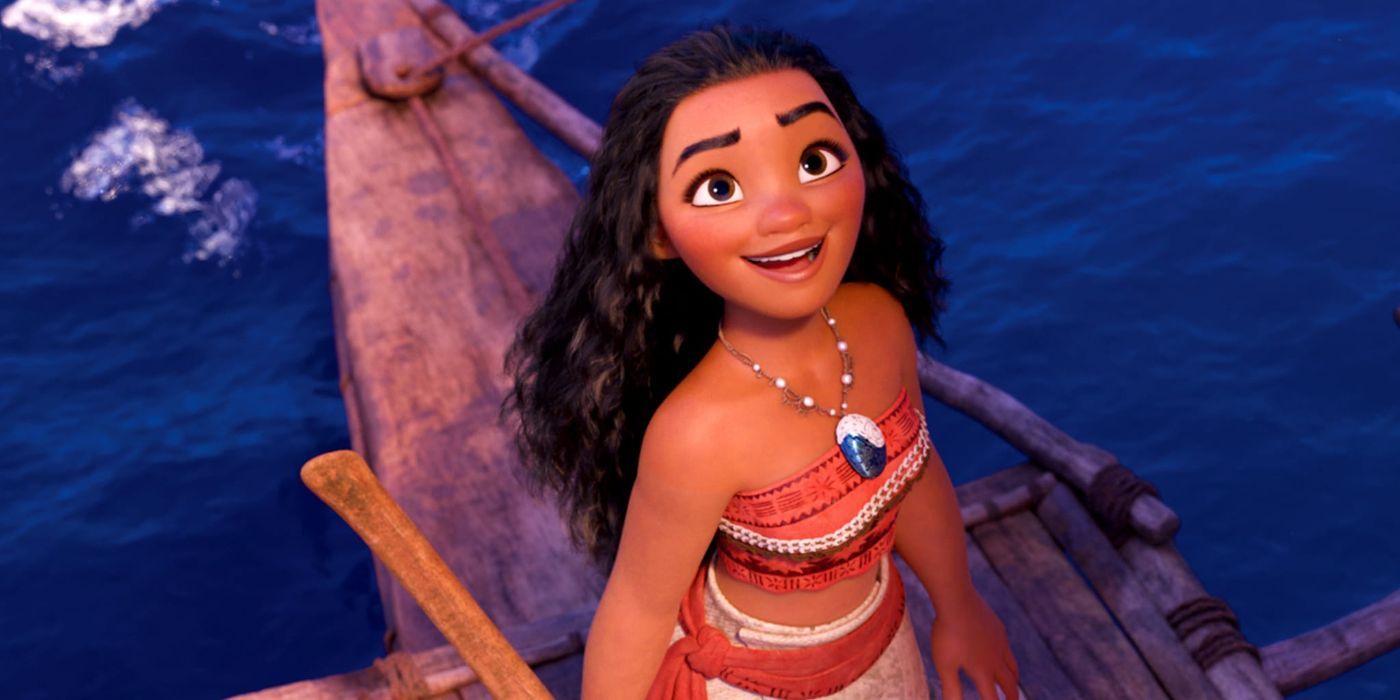 Moana olhando para o céu e sorrindo no oceano