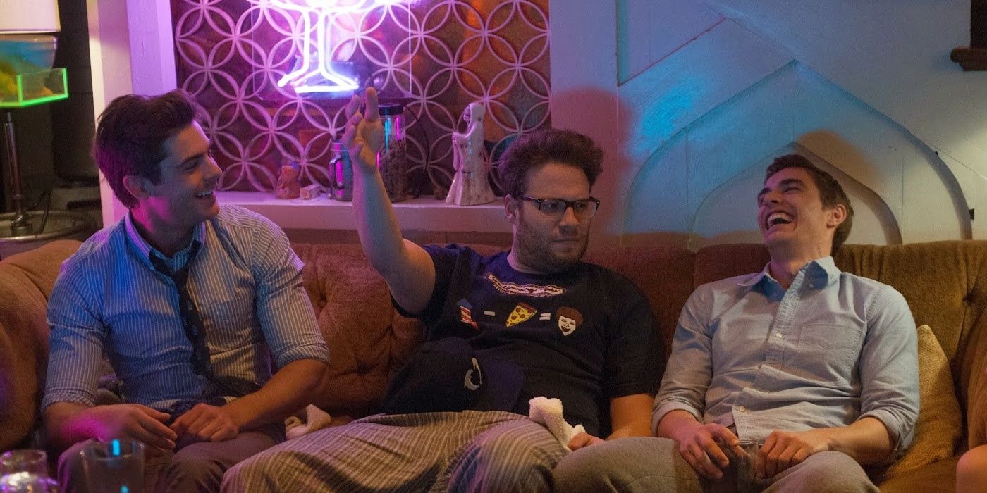 Zac Efron, Seth Rogen, and Dave Franco sitting on couch in Neighbors