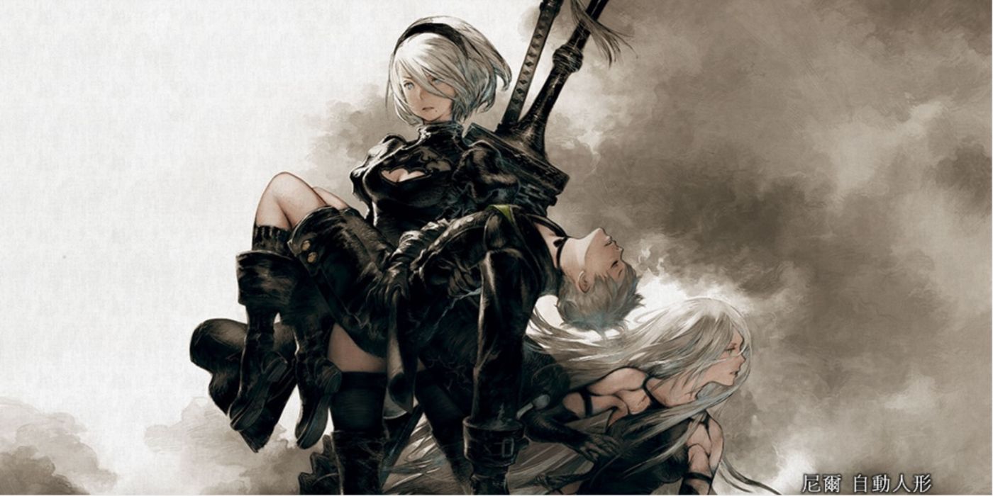 Key art of 2B carrying 9S and A2 crouched in the background.