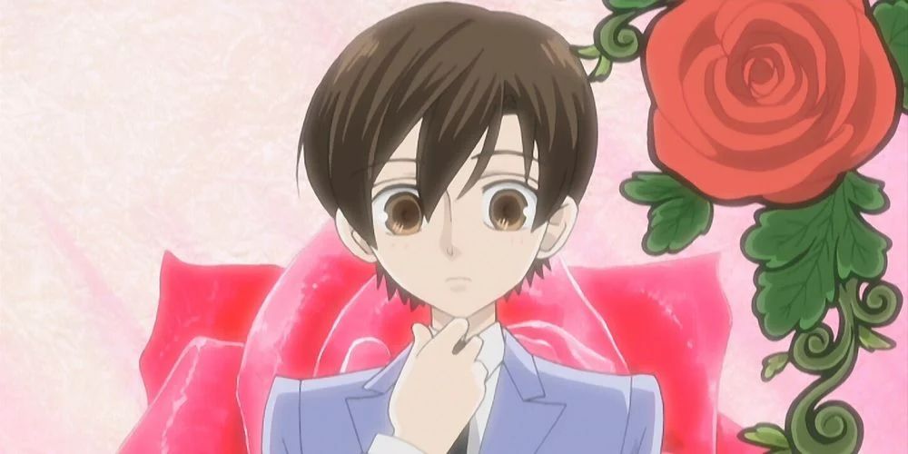 Image of Fujioka Haruhi in boy&rsquo;s school uniform surrounded by roses from opening theme