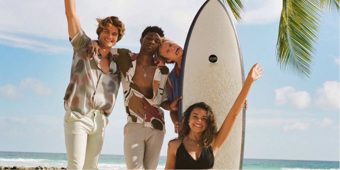 Outer Banks Cast Posing with Surfboard 1