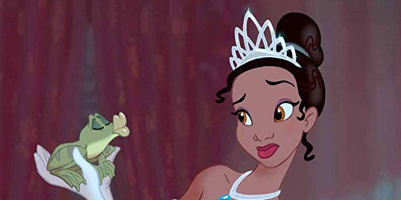 Princesa Tiana segurando o Príncipe Naveen em A Princesa e o Sapo