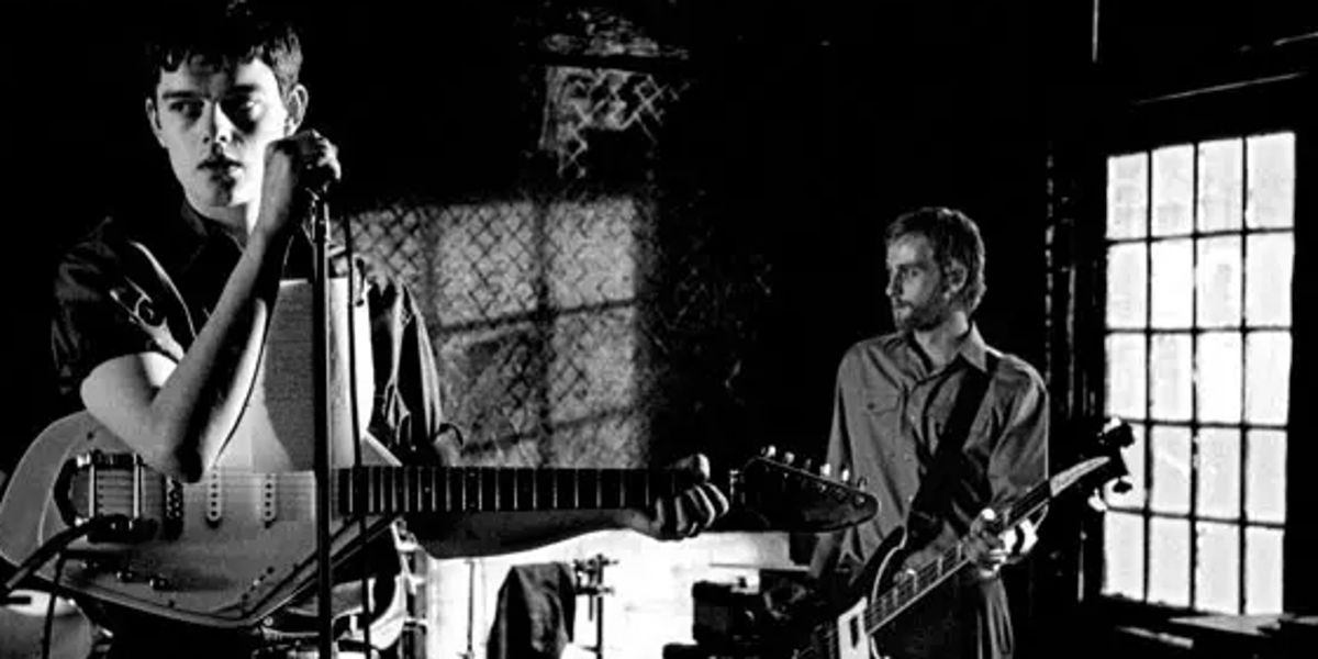 Sam Riley as Ian Curtis singing with Joy Division in Control