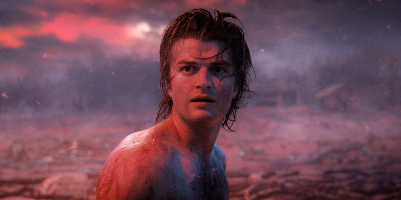 Steve Harrington in the water looking off dramatically