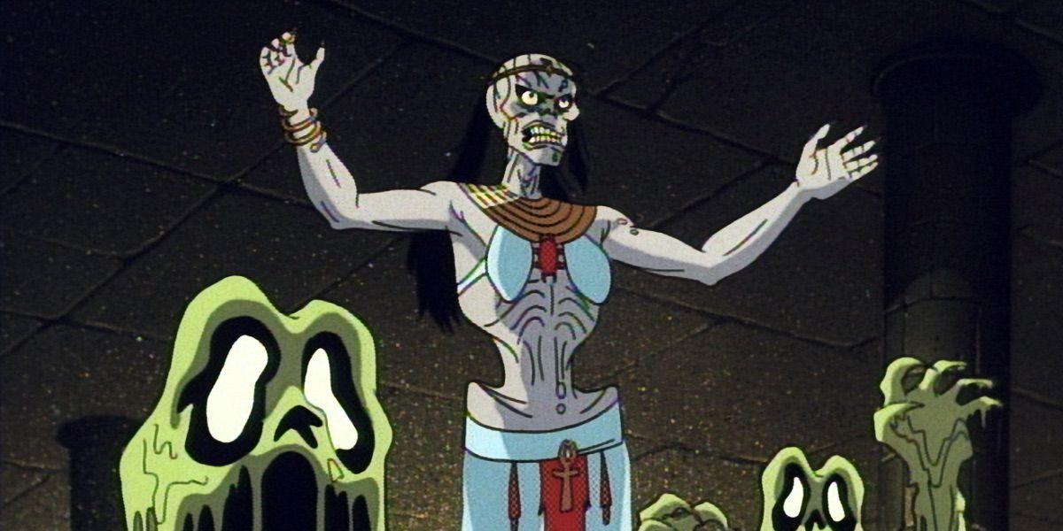 Thoth Khepera stands next to muck monsters from Batman the Animated Series 