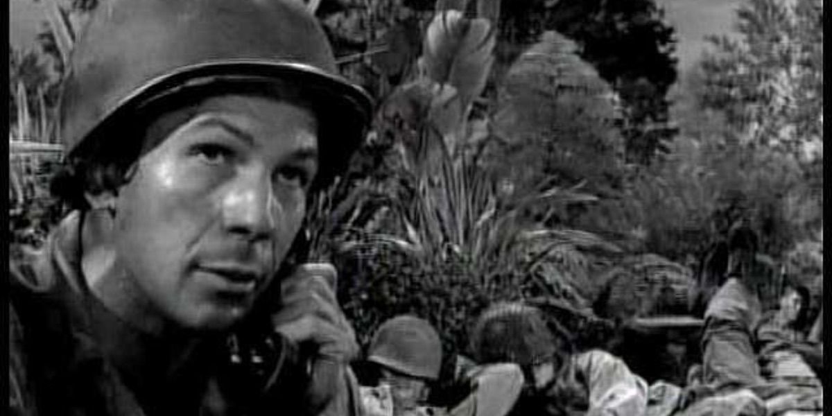 Leonard Nimoy looks on while using the field phone from The Twilight Zone