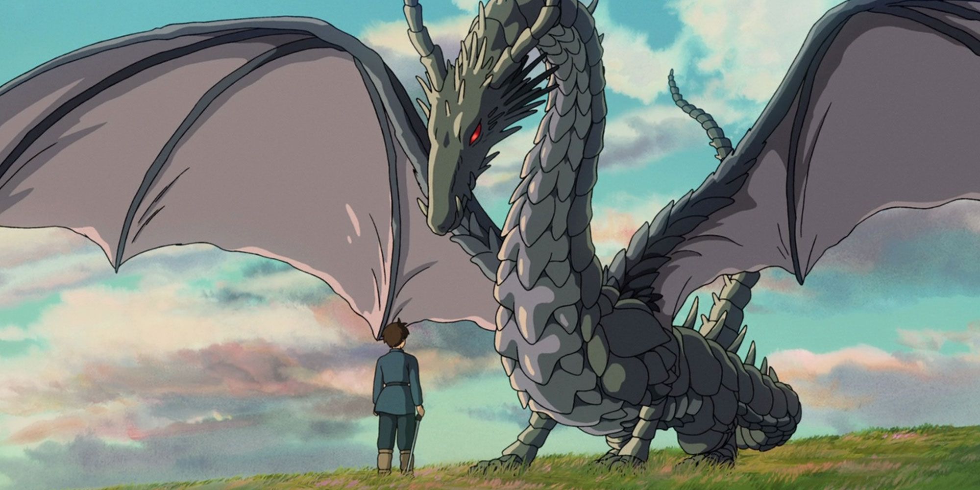 The dragon looms over a boy in Tales From Earthsea