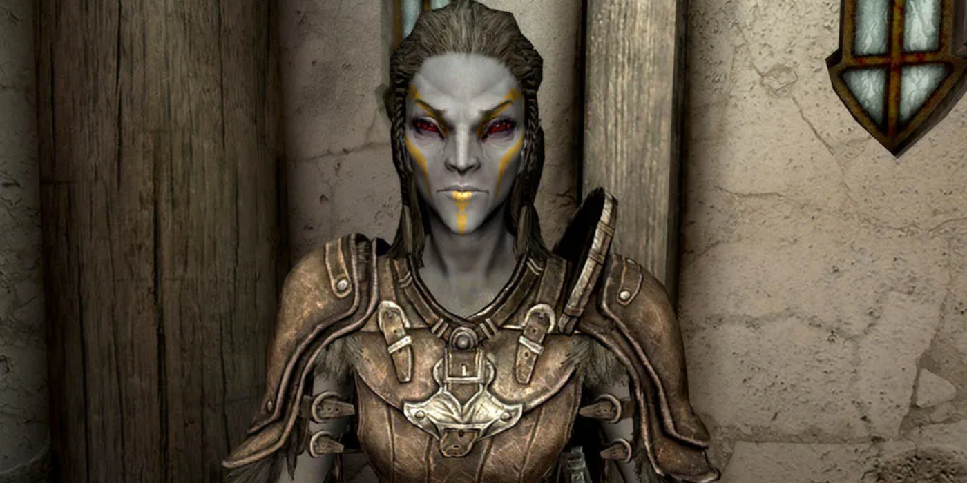 A close-up shot of Skyrim's Jenassa looking stern and professional with yellow war paint on.
