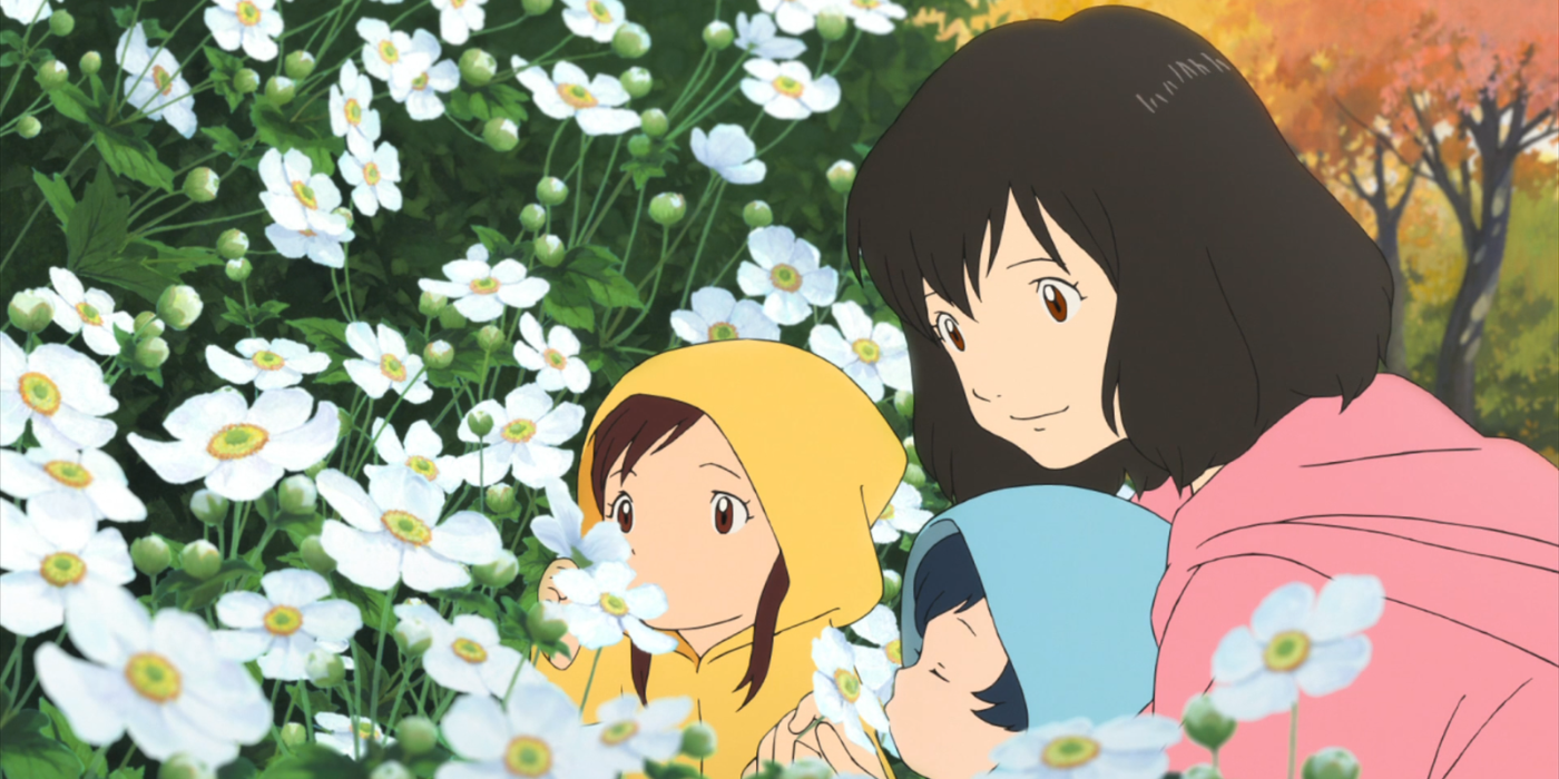 The Wolf Children looking at pretty flowers